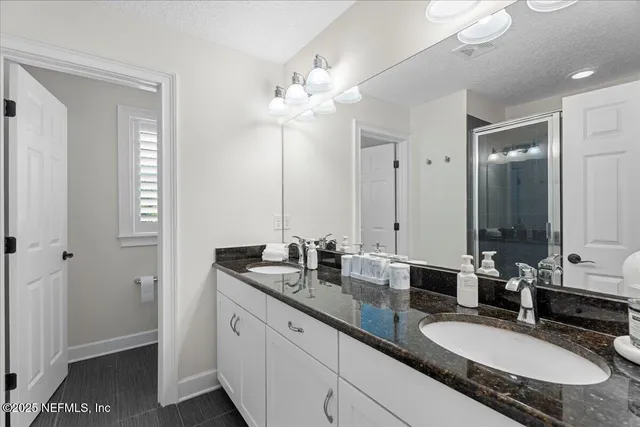 an aerial view of city and lake