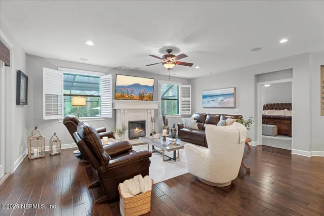 a kitchen with stainless steel appliances granite countertop a sink a stove and refrigerator