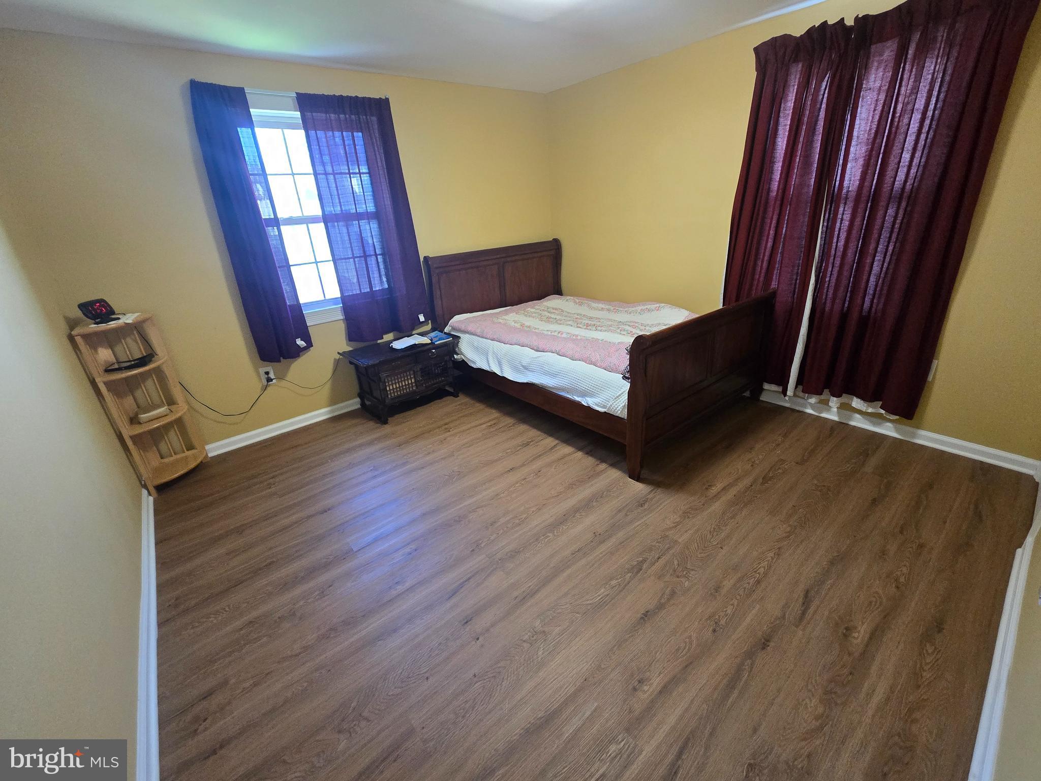 194 Atlantic Avenue Hamilton, NJ 08609 - Photo 13 of 43 a bedroom with a bed and window