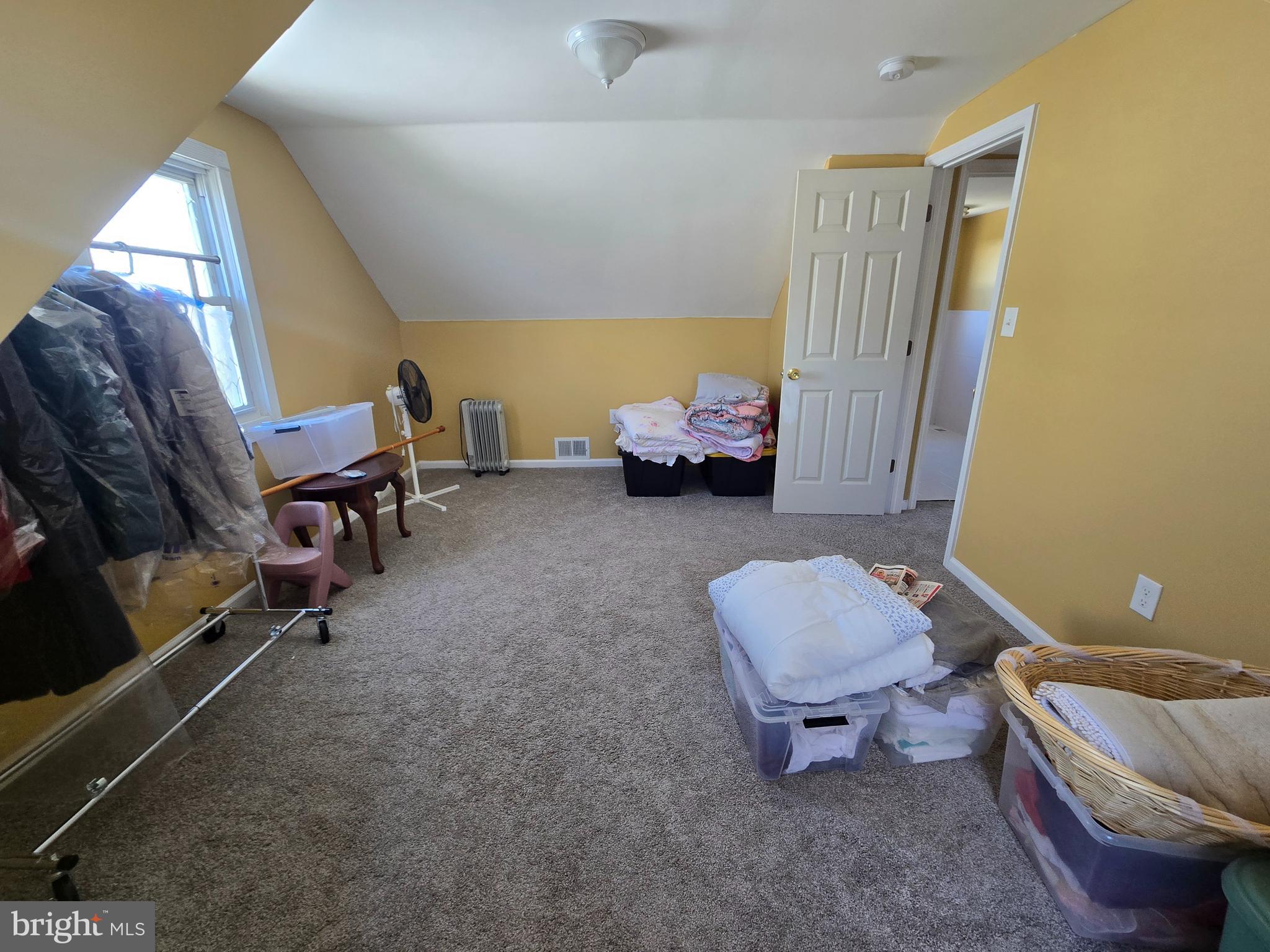 194 Atlantic Avenue Hamilton, NJ 08609 - Photo 22 of 43 a living room with furniture and a window