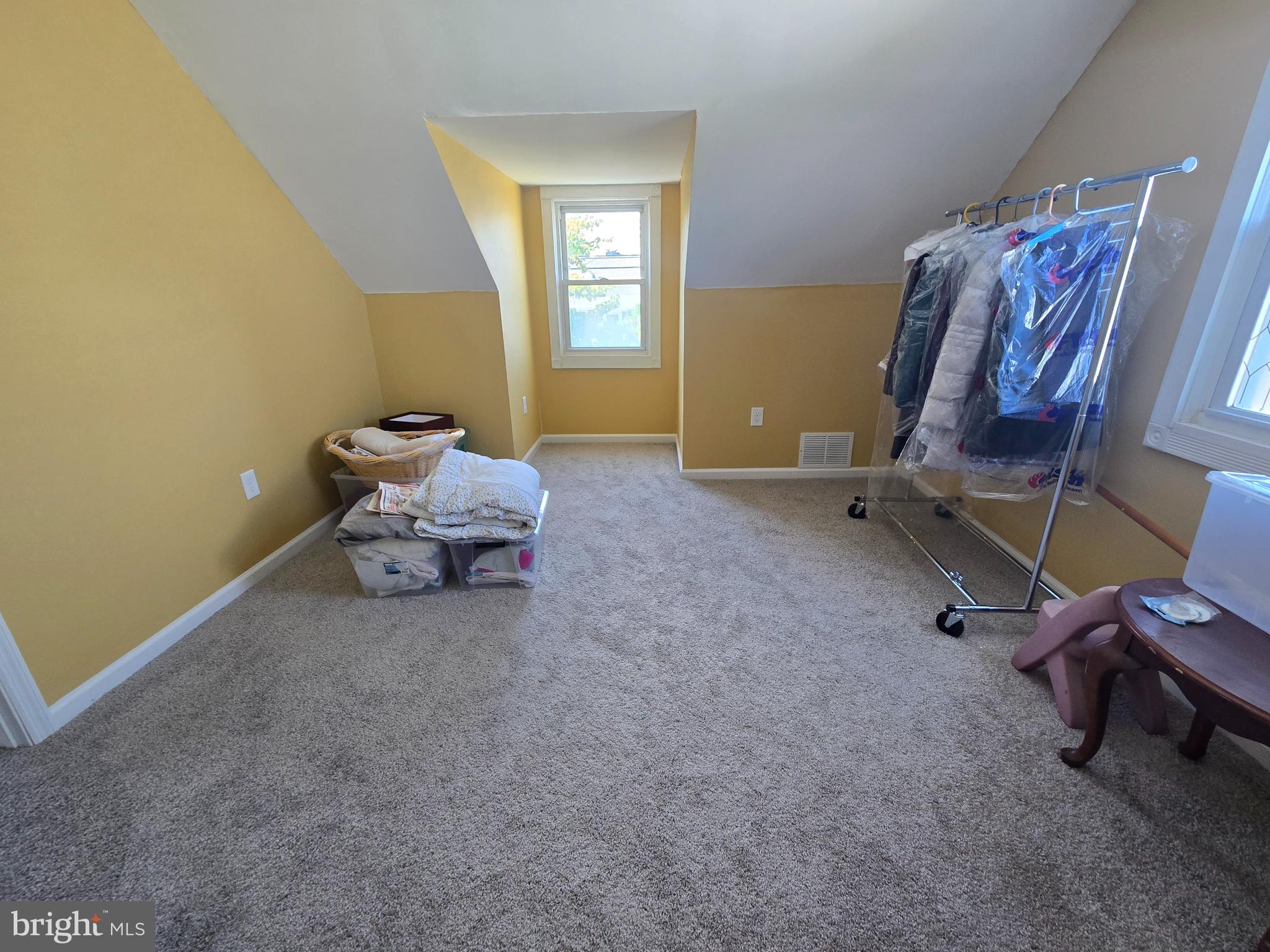194 Atlantic Avenue Hamilton, NJ 08609 - Photo 23 of 43 a living room with furniture and a window