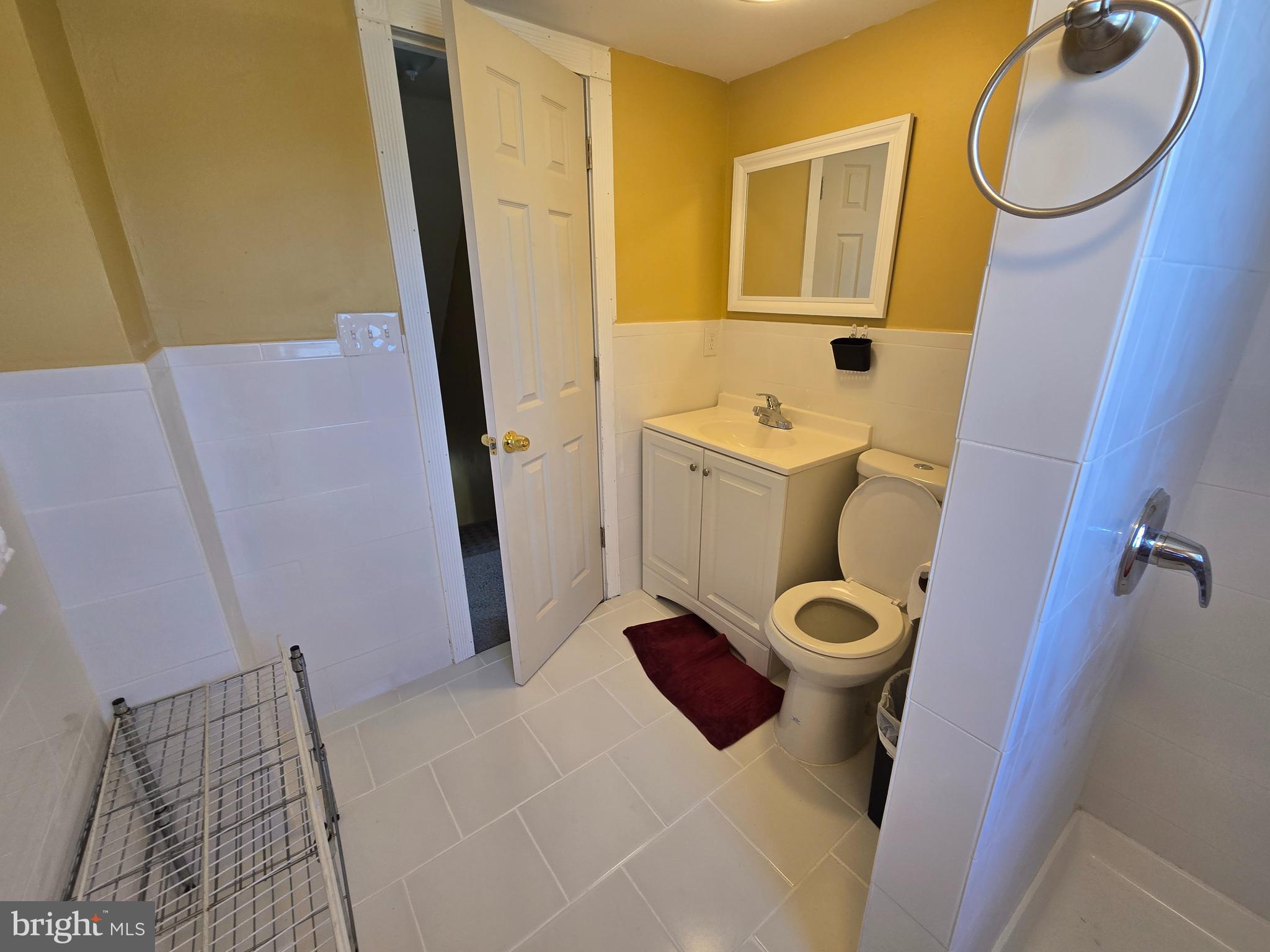 194 Atlantic Avenue Hamilton, NJ 08609 - Photo 28 of 43 a bathroom with a toilet and a sink