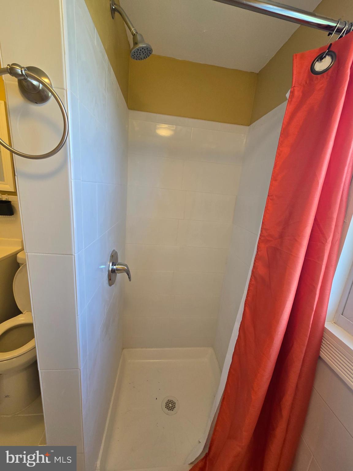 194 Atlantic Avenue Hamilton, NJ 08609 - Photo 29 of 43 a bathroom with a sink and a shower