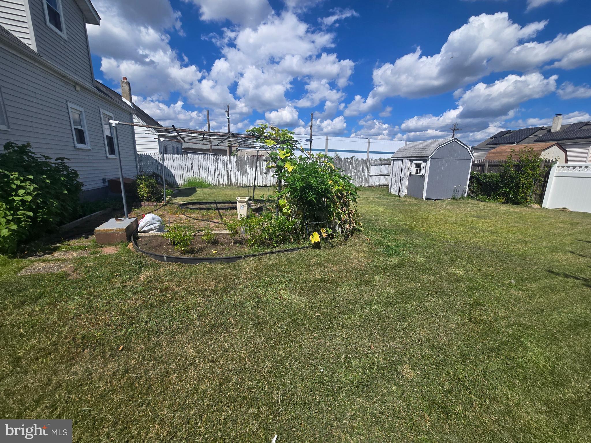 194 Atlantic Avenue Hamilton, NJ 08609 - Photo 4 of 43 a front view of a house with a yard