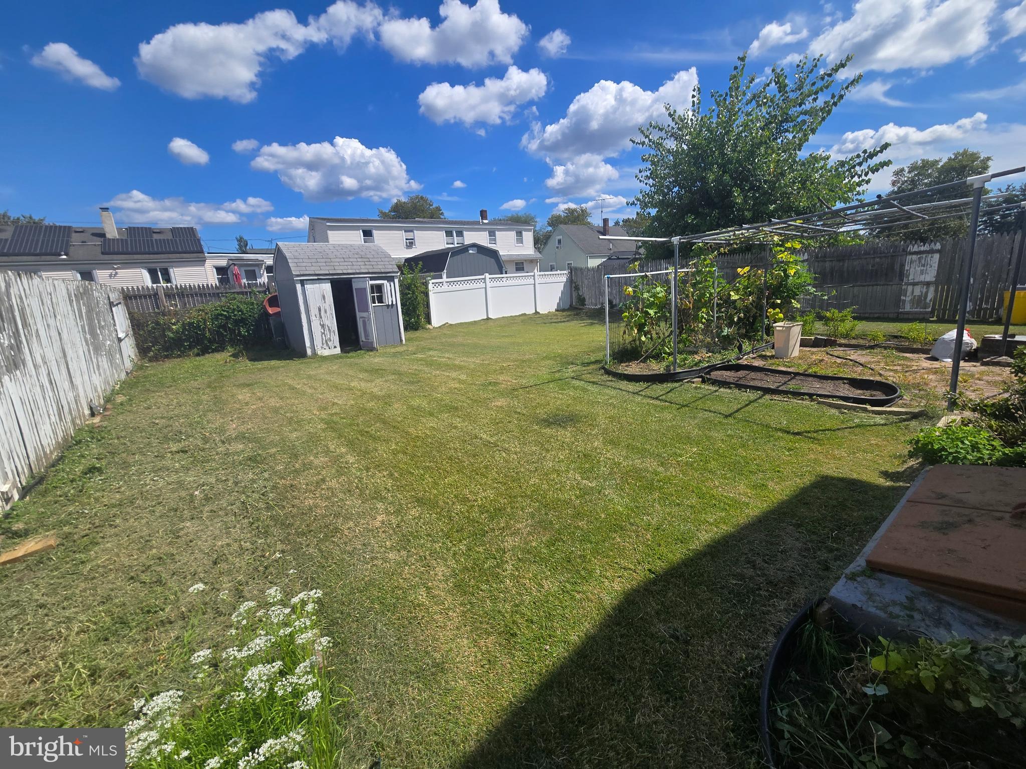 194 Atlantic Avenue Hamilton, NJ 08609 - Photo 5 of 43 a view of a house with backyard and sitting area