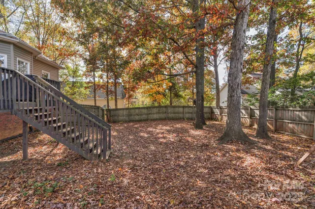 a view of backyard with green space