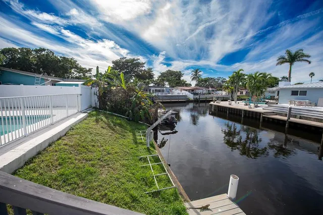 a view of a lake with a garden