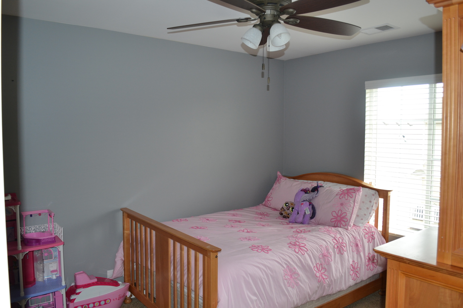 3372 Cameron Drive Elgin, IL 60124 - Photo 14 of 18 a bedroom with a bed and a chandelier fan