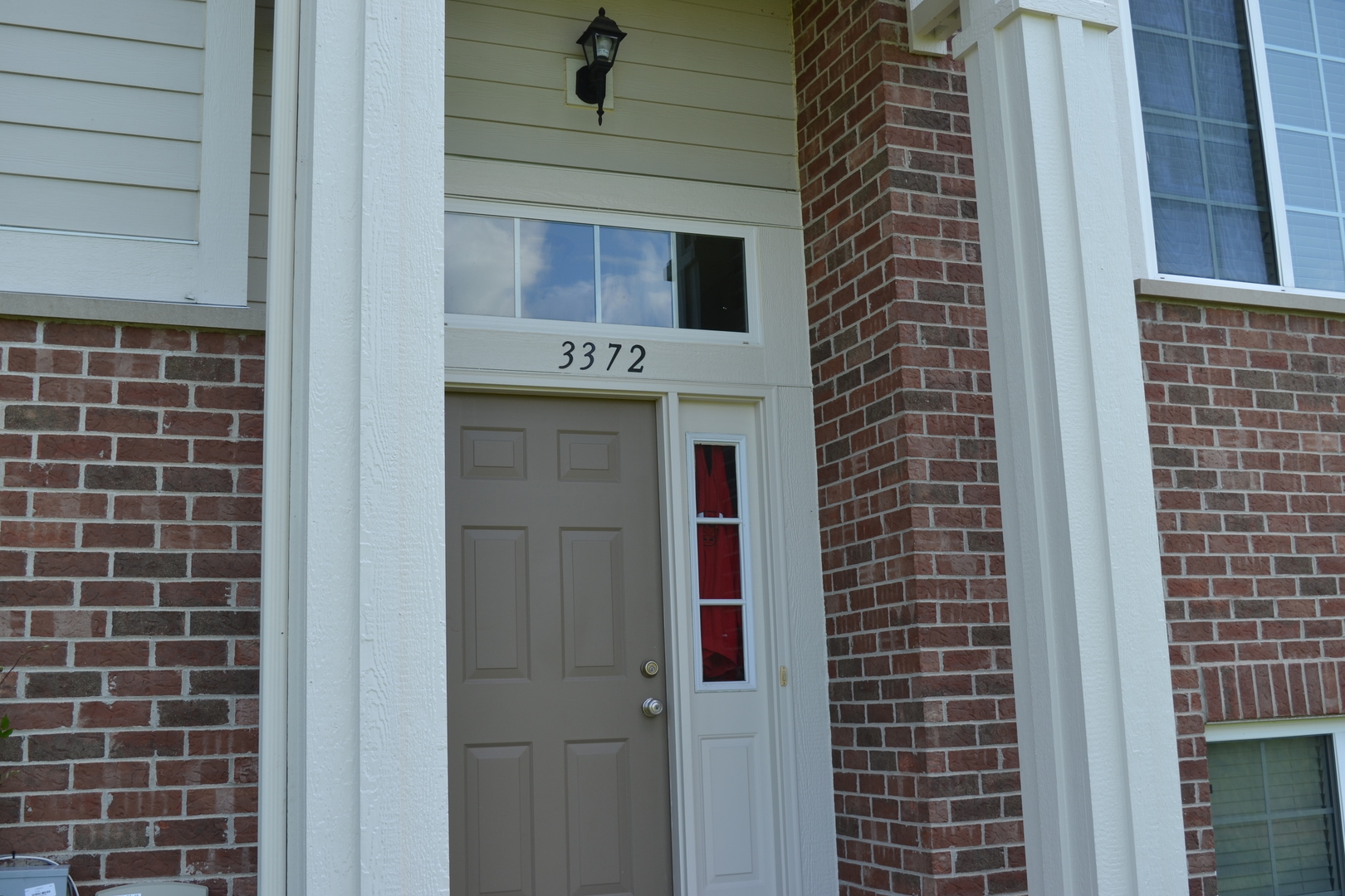 3372 Cameron Drive Elgin, IL 60124 - Photo 16 of 18 a view of a door and brick wall
