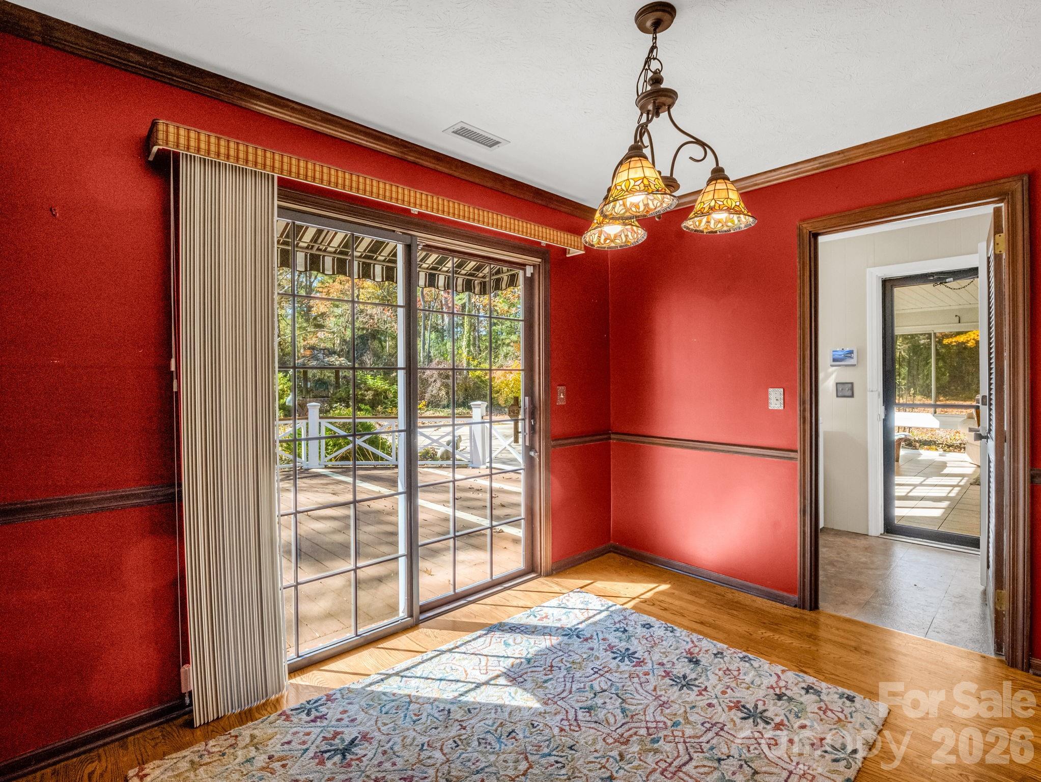 1867 Fruitland Road Hendersonville, NC 28792 - Photo 11 of 47 a view of a room with window and wooden floor