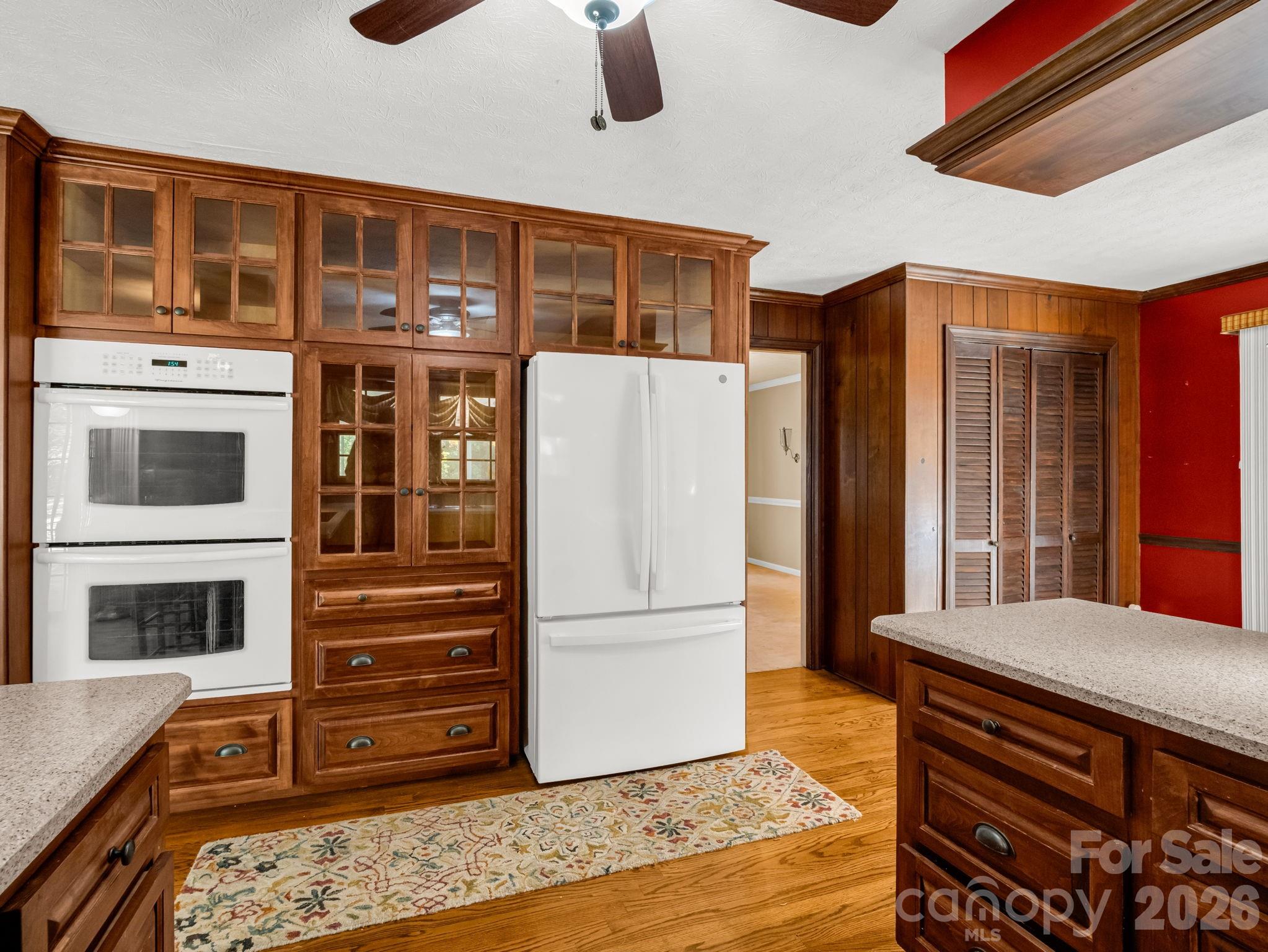 1867 Fruitland Road Hendersonville, NC 28792 - Photo 12 of 47 a kitchen with stainless steel appliances granite countertop a refrigerator and a stove top oven
