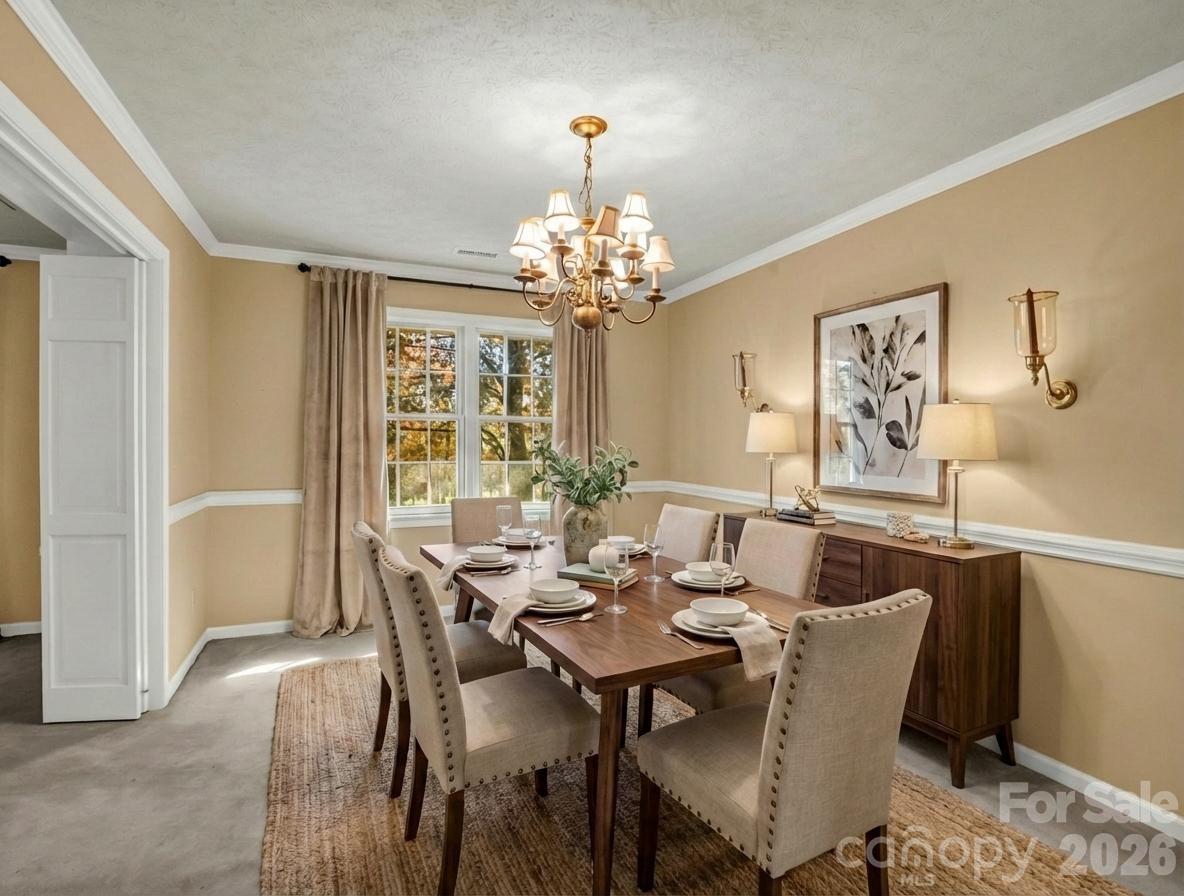 1867 Fruitland Road Hendersonville, NC 28792 - Photo 19 of 47 a view of a dining room with furniture window and outside view