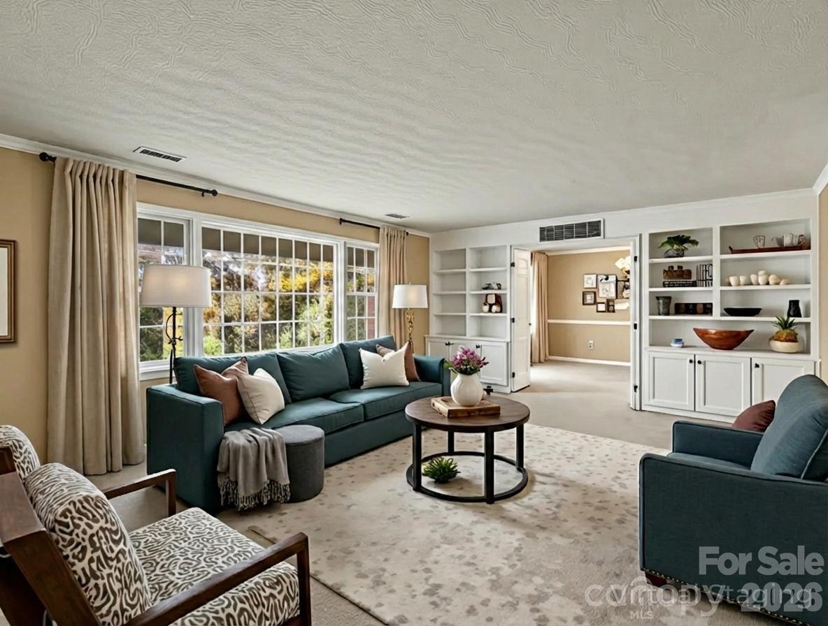 1867 Fruitland Road Hendersonville, NC 28792 - Photo 21 of 47 a living room with furniture and a window