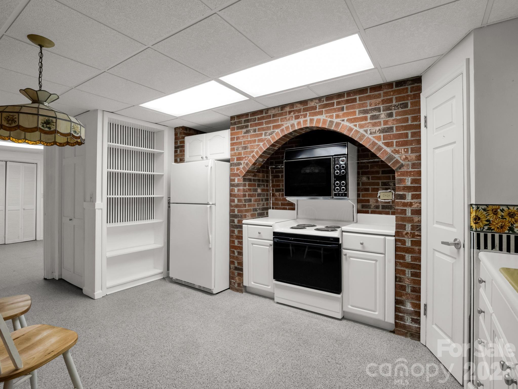 1867 Fruitland Road Hendersonville, NC 28792 - Photo 36 of 47 a view of kitchen with sink and refrigerator