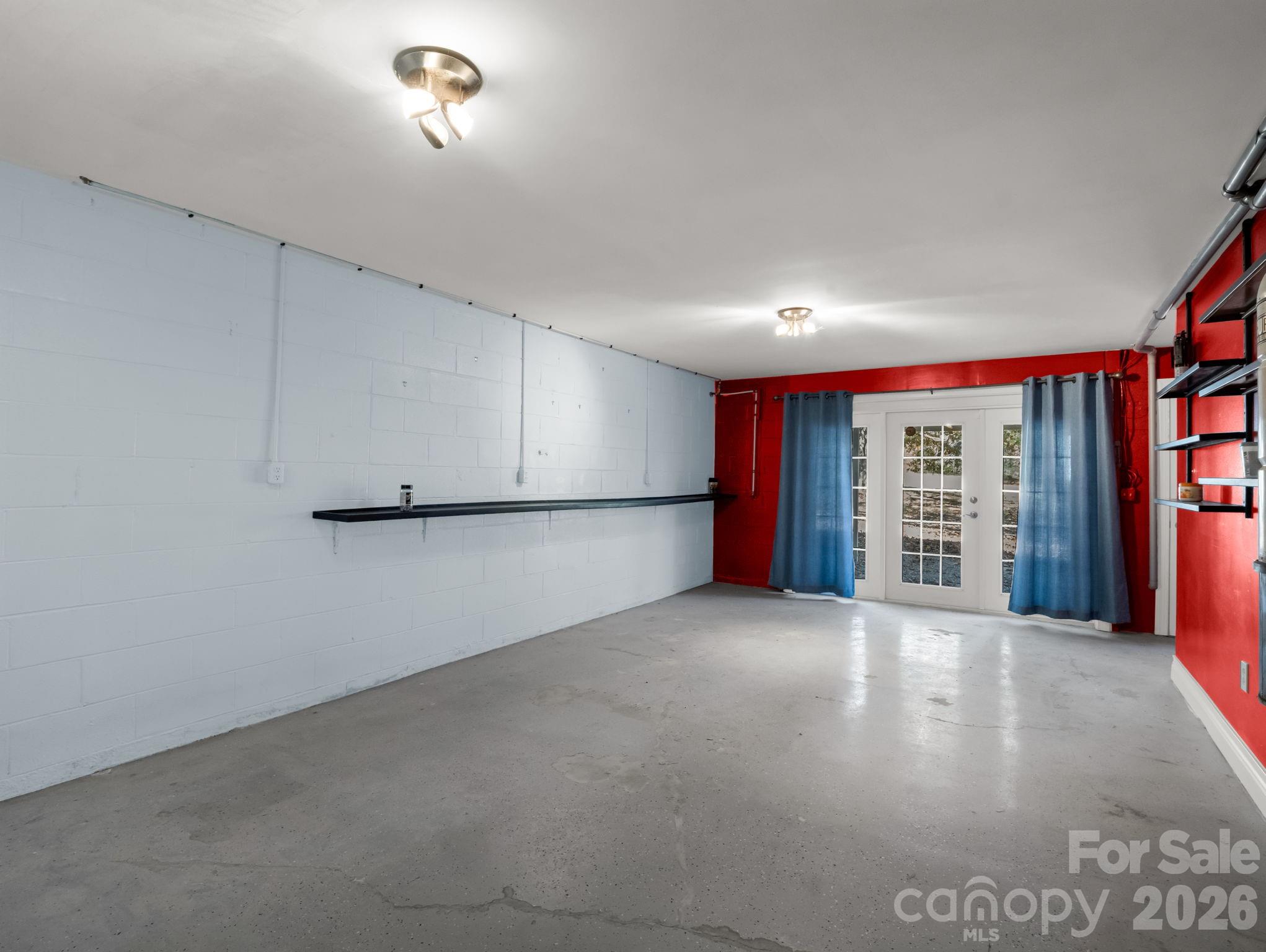 1867 Fruitland Road Hendersonville, NC 28792 - Photo 40 of 47 a view of an empty room with a window