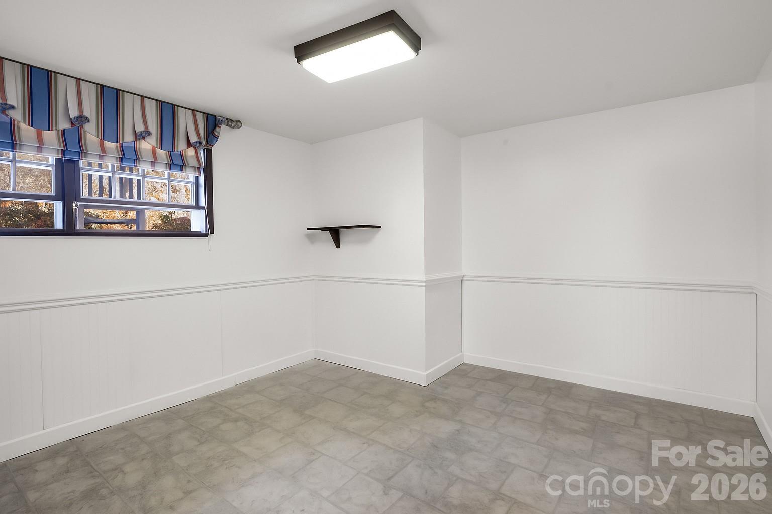 1867 Fruitland Road Hendersonville, NC 28792 - Photo 41 of 47 a view of small space with racks on the wall