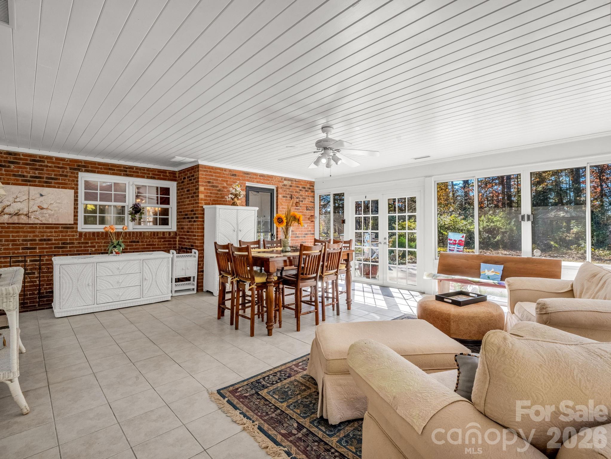 1867 Fruitland Road Hendersonville, NC 28792 - Photo 9 of 45 a living room with furniture and a large window