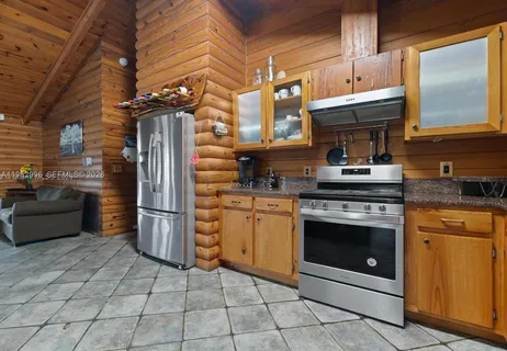 a bed room with a bed and a cabinets