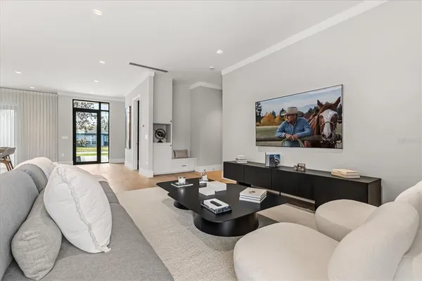 a spacious bedroom with a bed and window