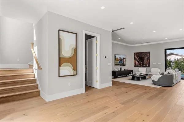 a bedroom with bed and a window