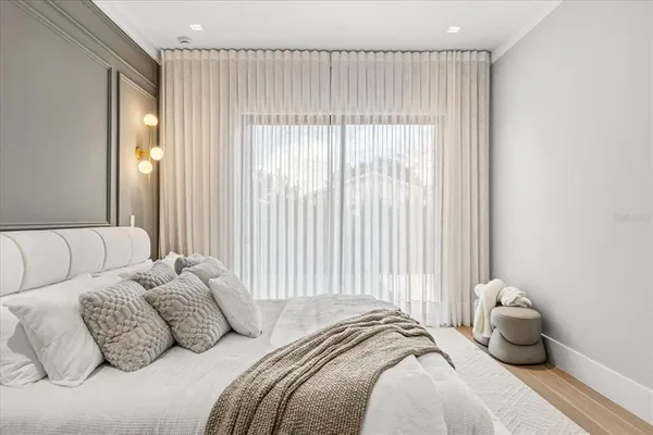 a bathroom with a double vanity sink mirror and