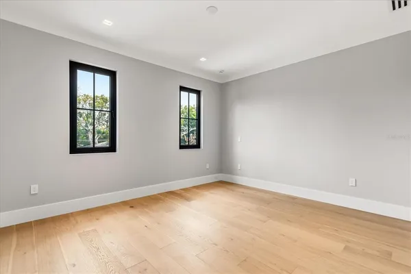 a bathroom with a toilet sink and shower
