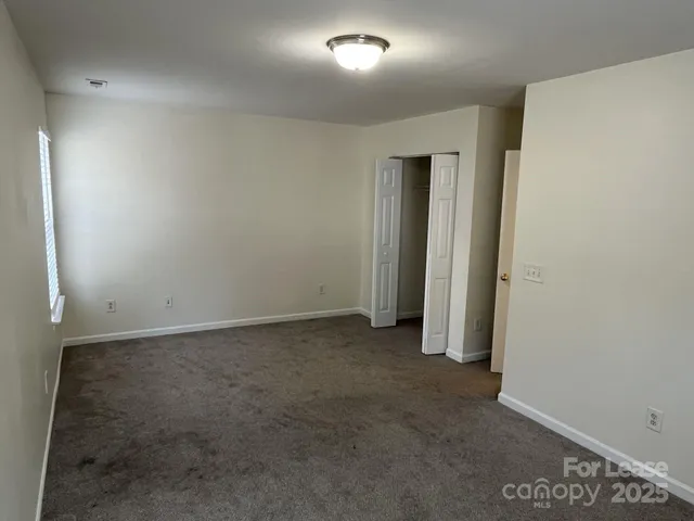 an empty room with closet