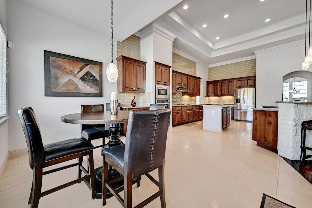 7300 Gilbert Road Manor, TX 78653 - Photo 17 of 40 a living room with furniture a dining table and kitchen view