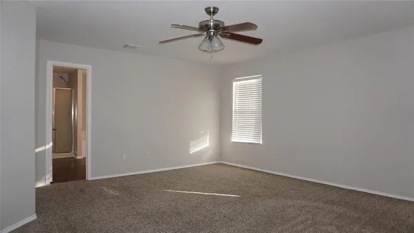 a view of a window in an empty room