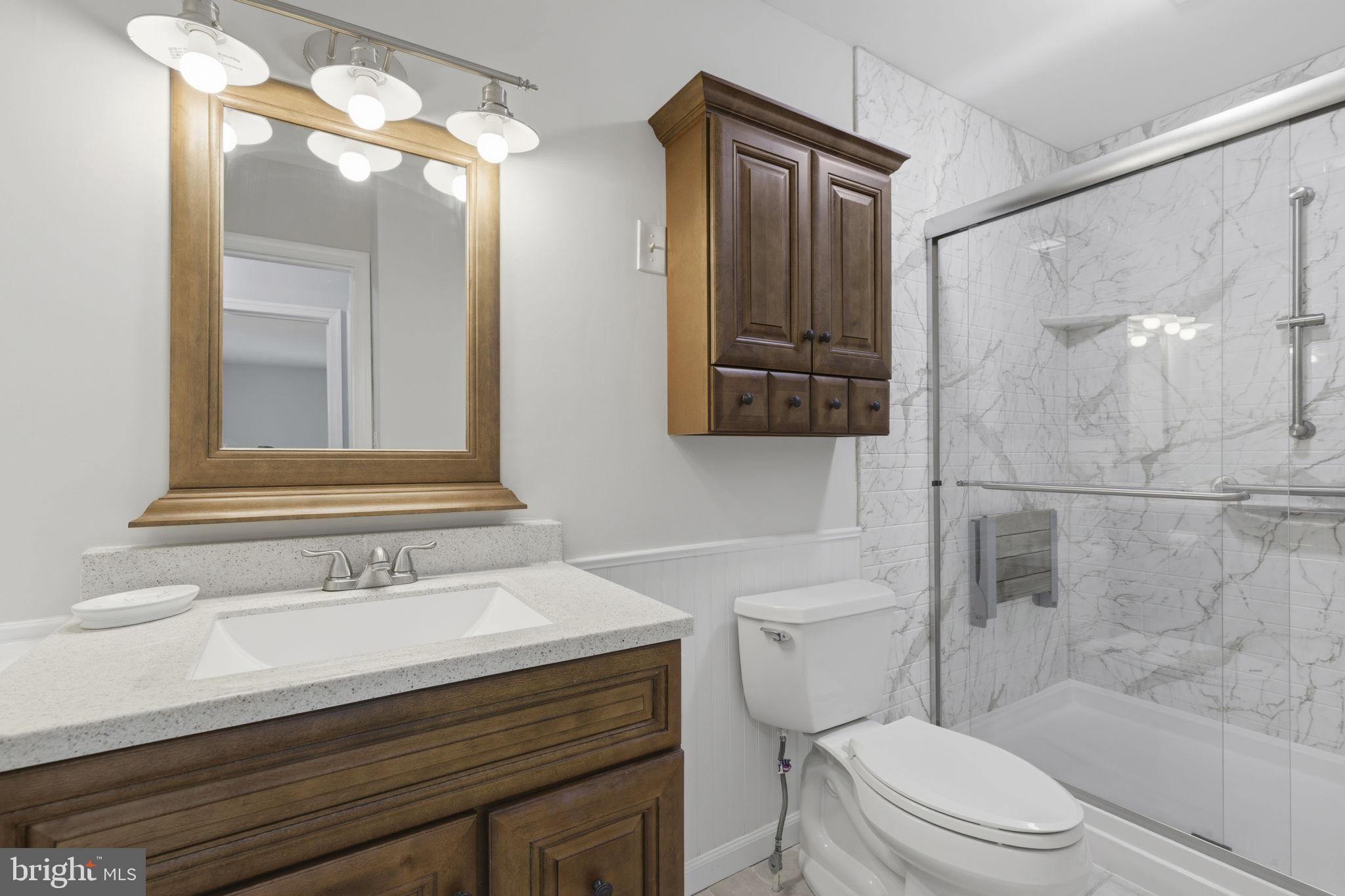 3831 Wilkinson Road Havre de Grace, MD 21078 - Photo 19 of 51 a bathroom with a sink toilet vanity and shower