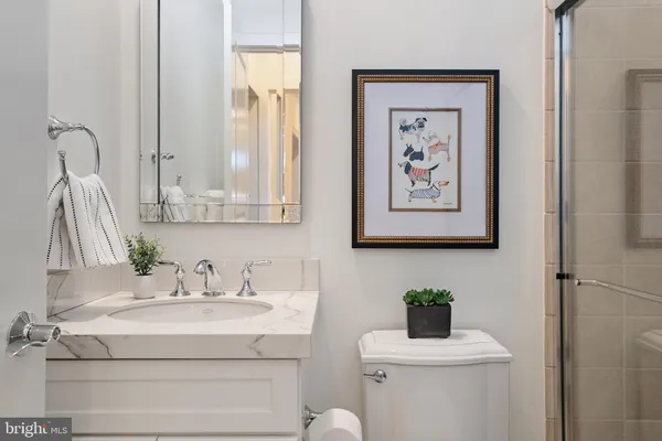 a view of a chairs and table in balcony