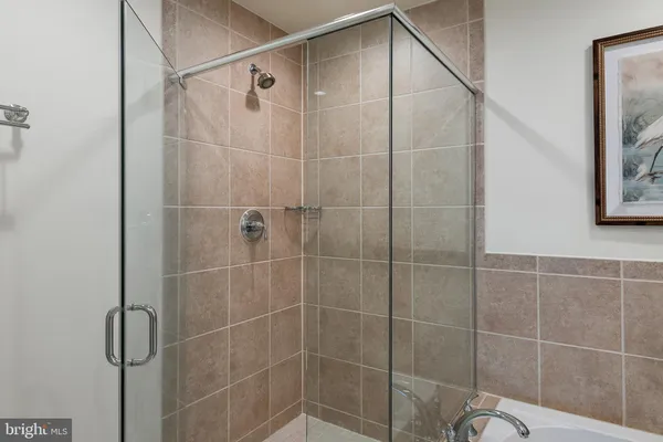 a living room with fireplace furniture and a flat screen tv