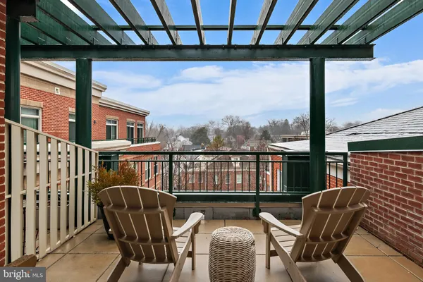 a living room with a book shelf and a book shelf