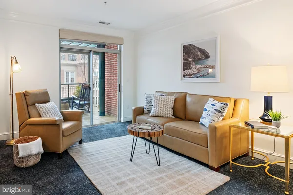 a living room with furniture and a view