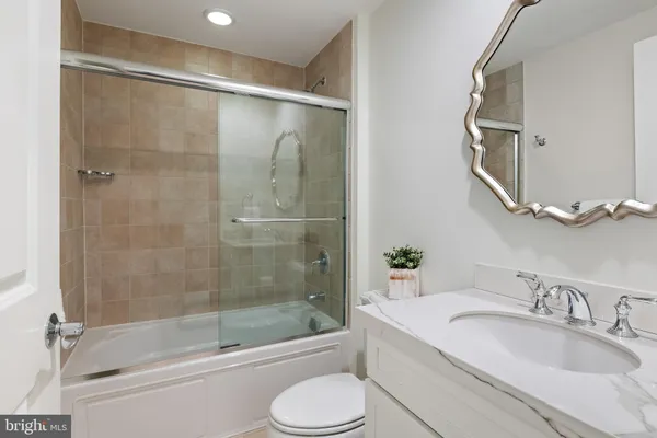 a swimming pool with outdoor seating and yard