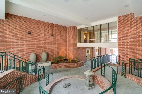 an aerial view of a multi story residential apartment building