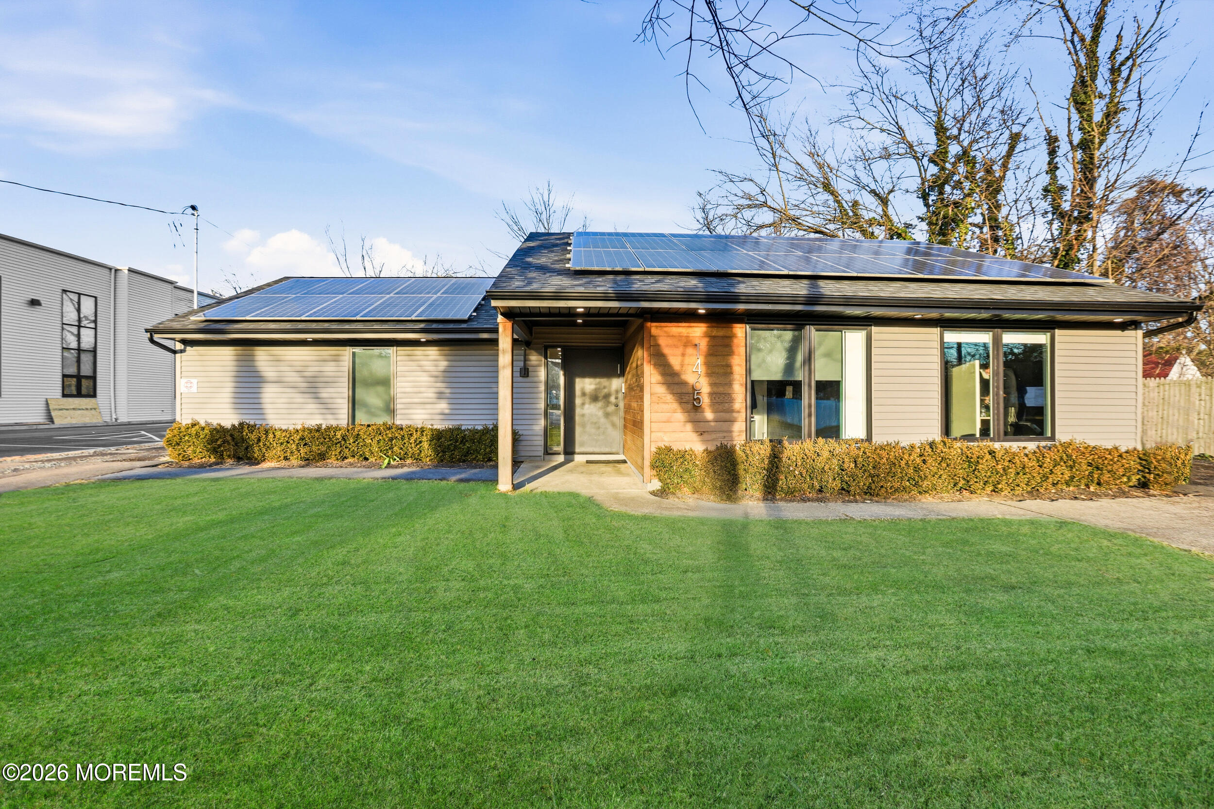 1465 Lanes Mill Road Lakewood, NJ 08701 - Photo 1 of 15 a view of a house with a backyard