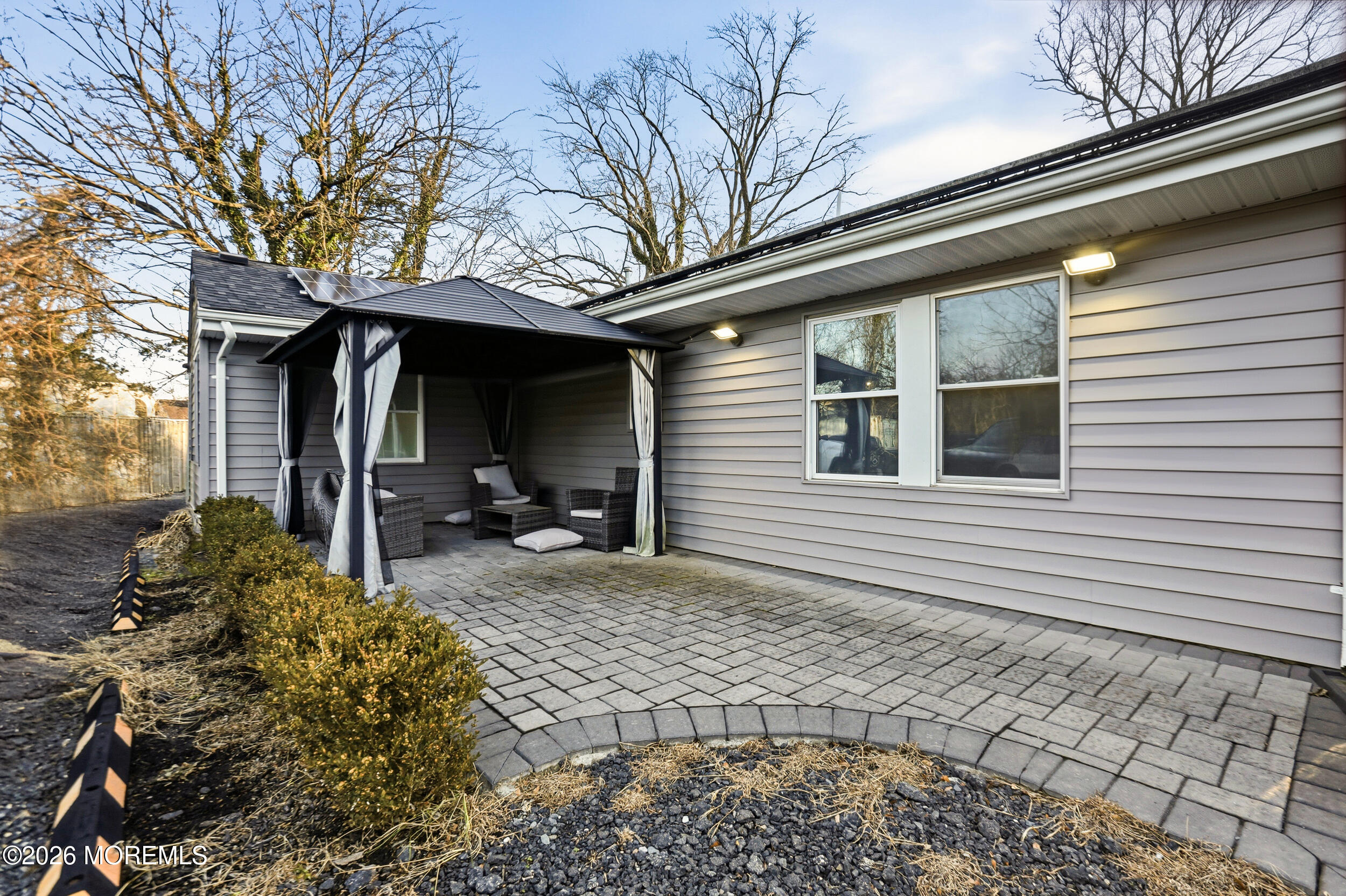 1465 Lanes Mill Road Lakewood, NJ 08701 - Photo 6 of 15 a house view with a outdoor space