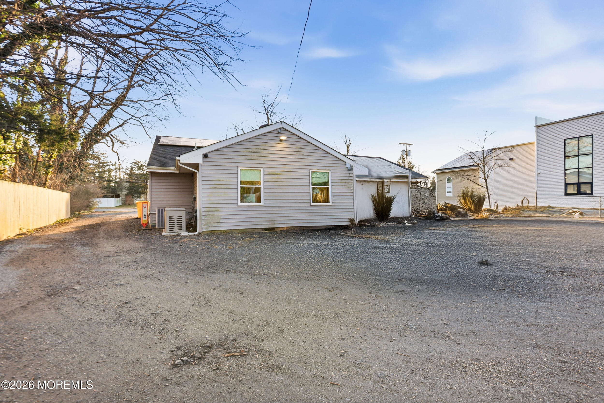 1465 Lanes Mill Road Lakewood, NJ 08701 - Photo 8 of 15 a view of a house with a backyard