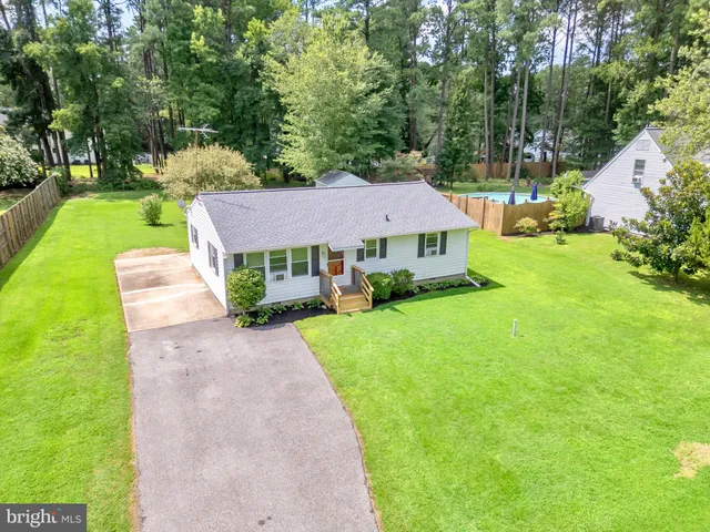 a aerial view of a house with garden