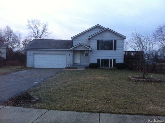 425 Henry Howell, MI 48843 - Photo 1 of 1 front exterior.JPG