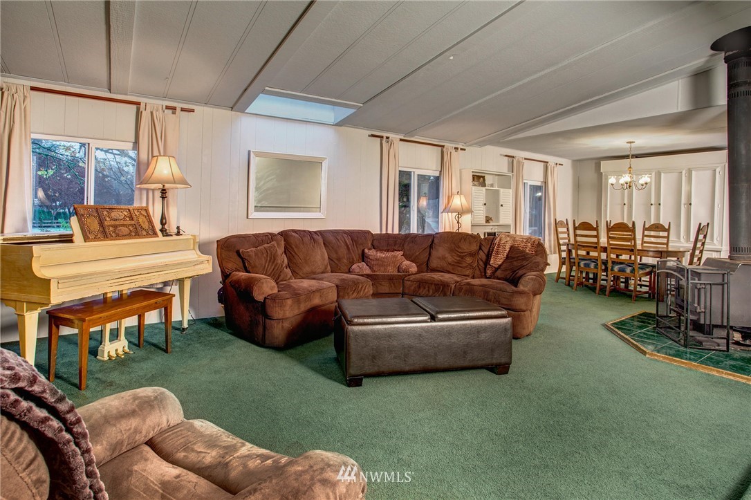 13306 Wagner Road Monroe, WA 98272 - Photo 3 of 23 a living room with furniture and a large window