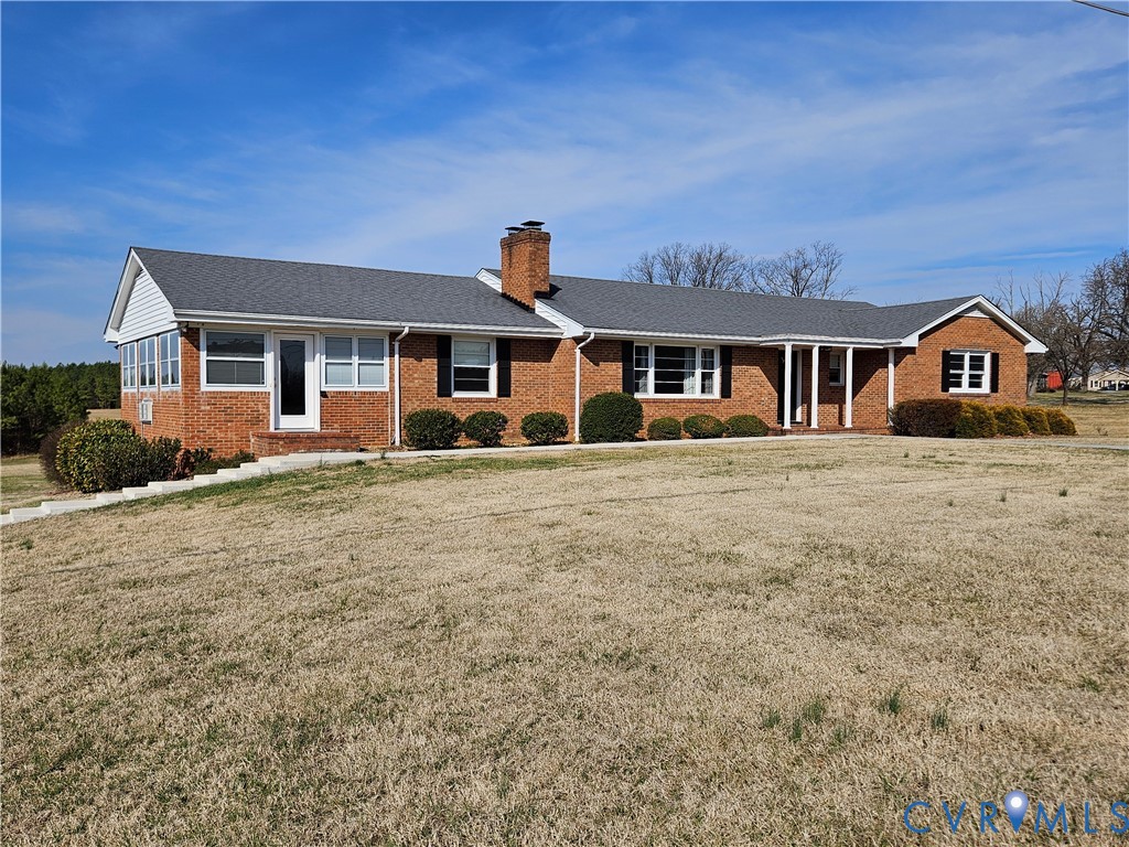front view of a house with a yard