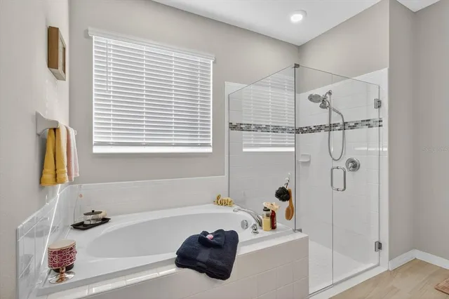 a view of a house with a yard and a porch