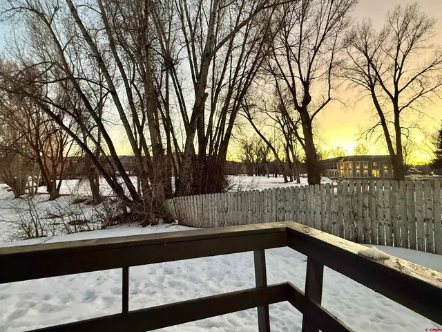 a front view of a house with garage