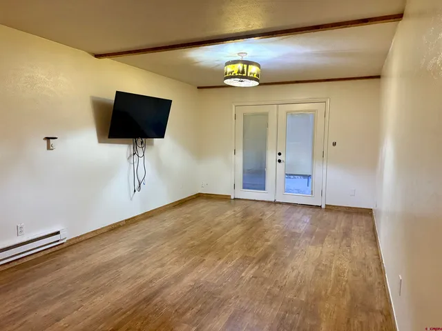 a view of a livingroom with a flat screen tv