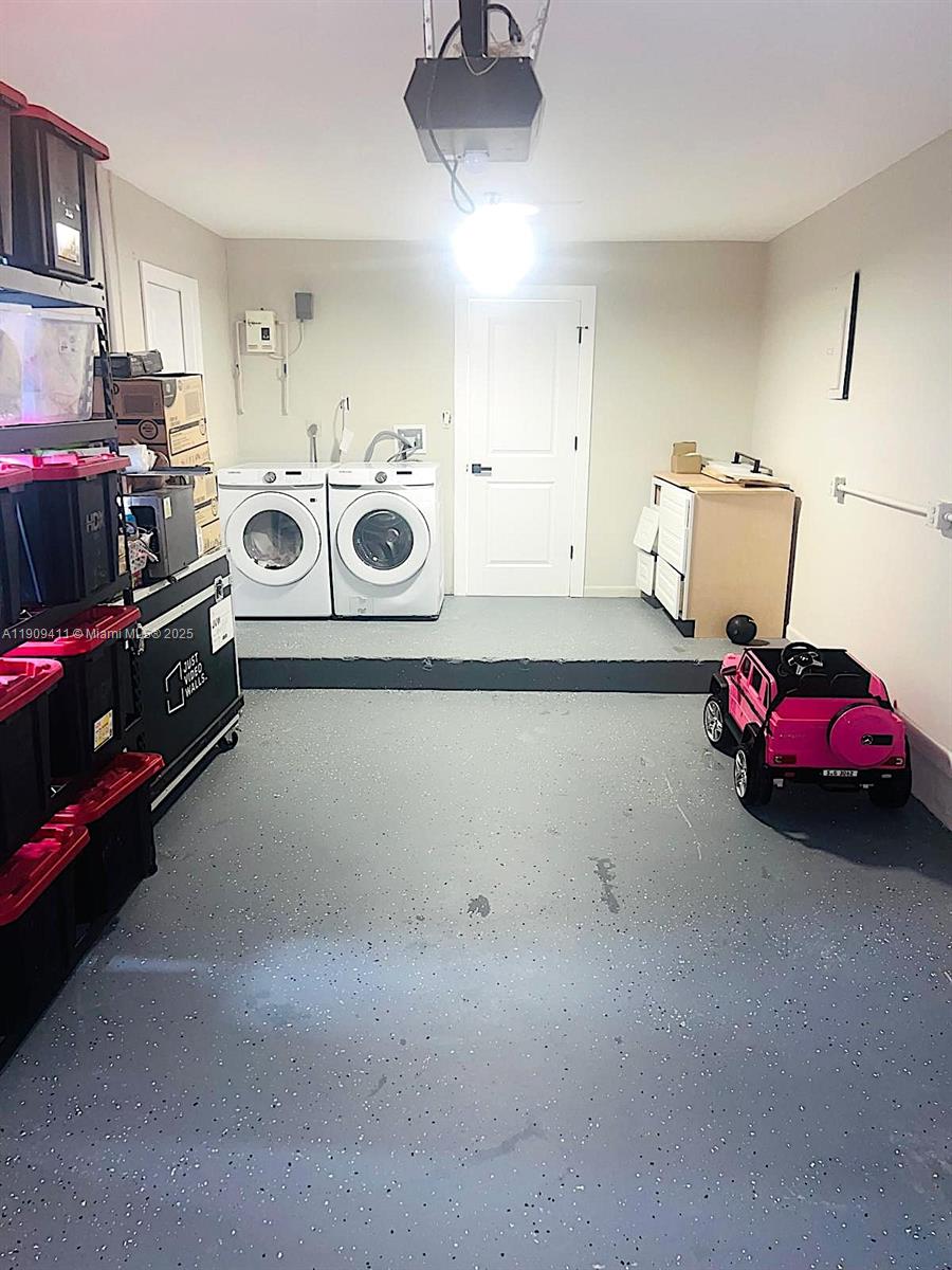 9703 Southwest 2nd Street Boca Raton, FL 33428 - Photo 10 of 17 a utility room with dryer and washer
