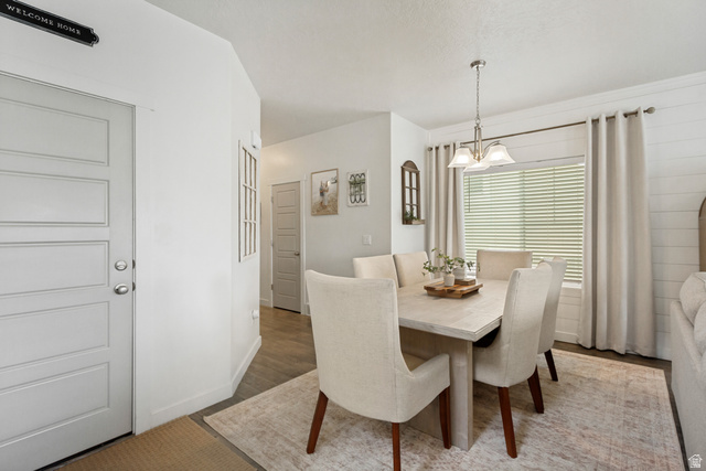 7693 West Mount Elinor Road Magna, UT 84044 - Photo 9 of 33 Recessed lighting, wood-finish flooring, and a contemporary light fixture