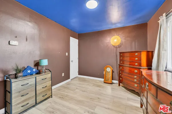 a view of a entryway door with furniture