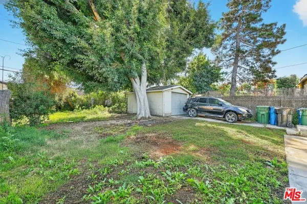 a house view with a garden space
